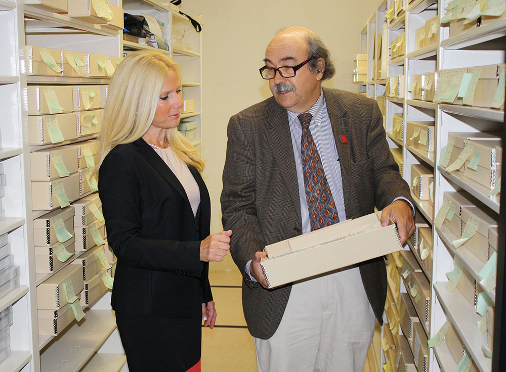 Monmouth County Clerk Christine Giordano Hanlon views newspaper archives with Monmouth County Archivist Gary D. Saretzky that will be discussed during the seminar “Newspaper Photo Archives at Archival repositories in New Jersey” on Sept. 30 from 9:30 to 11:45 a.m. at the Monmouth County Library Headquarters in Manalapan.